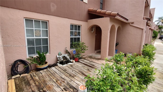 15 Laredo Pl Unit 2-7, Davie, FL 33324 - doorway to property with stucco siding