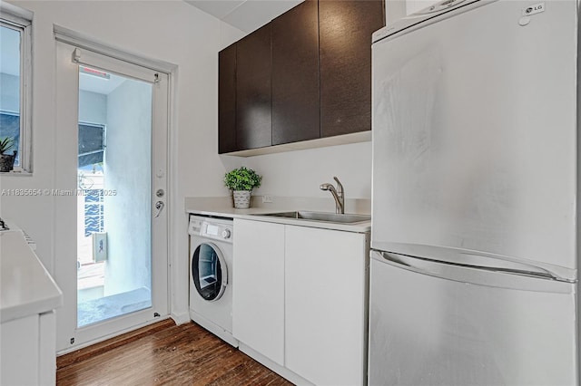 1616 Euclid Ave Unit 4, Miami Beach, FL 33139 - washroom featuring washer / clothes dryer and dark wood-style floors