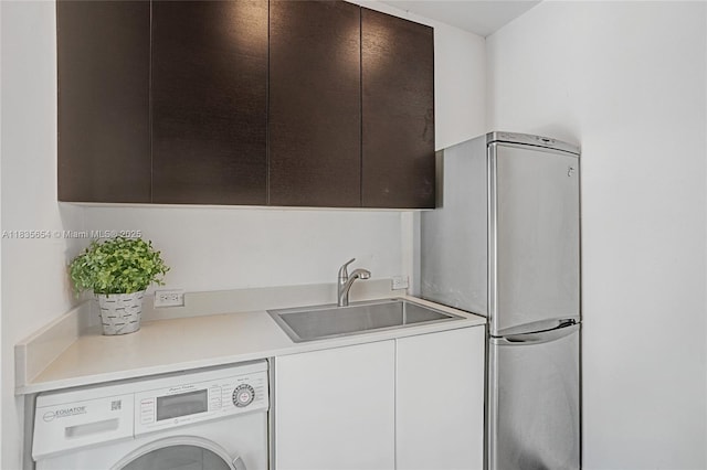1616 Euclid Ave Unit 4, Miami Beach, FL 33139 - washroom featuring washer / clothes dryer and a sink