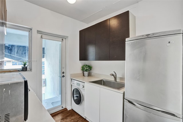 1616 Euclid Ave Unit 4, Miami Beach, FL 33139 - laundry area with washer / clothes dryer and dark wood-style floors