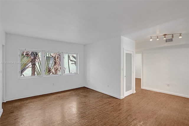 1616 Euclid Ave Unit 4, Miami Beach, FL 33139 - unfurnished room with wood finished floors and baseboards