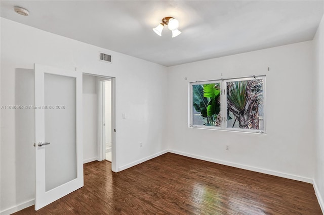 1616 Euclid Ave Unit 4, Miami Beach, FL 33139 - unfurnished bedroom featuring wood finished floors and baseboards