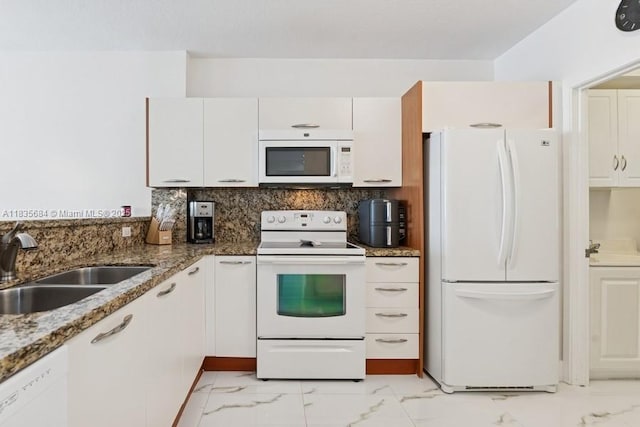 18100 N Bay Rd Unit 1108, Sunny Isles Beach, FL 33160 - kitchen with white appliances, light marble finish flooring, and white cabinets