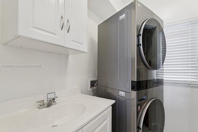 18100 N Bay Rd Unit 1108, Sunny Isles Beach, FL 33160 - washroom featuring stacked washer / dryer and a sink