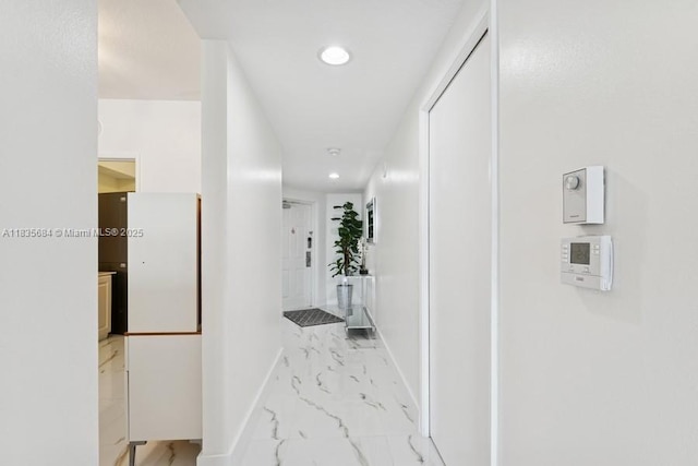 18100 N Bay Rd Unit 1108, Sunny Isles Beach, FL 33160 - hall featuring light marble finish floors and recessed lighting