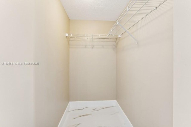 18100 N Bay Rd Unit 1108, Sunny Isles Beach, FL 33160 - walk in closet with marble finish flooring