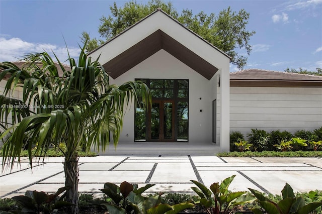 6445 SW 102nd Ave, Miami, FL 33173 - doorway to property with stucco siding