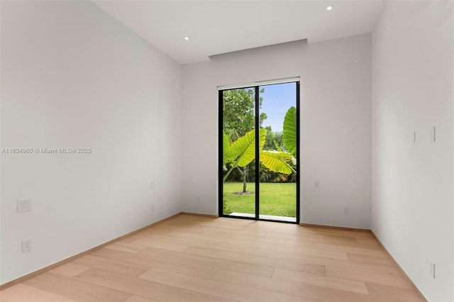 6445 SW 102nd Ave, Miami, FL 33173 - empty room featuring light wood finished floors and recessed lighting