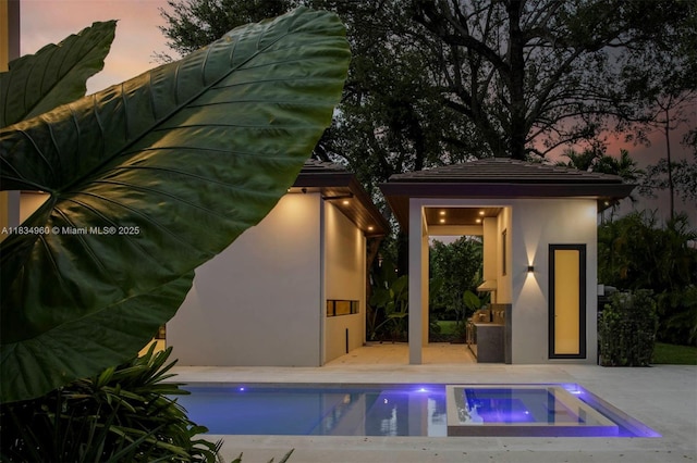 6445 SW 102nd Ave, Miami, FL 33173 - view of swimming pool featuring an outdoor structure and a patio area