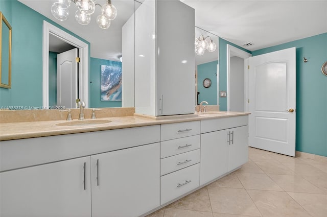 200 E Palmetto Park Rd Unit 714, Boca Raton, FL 33432 - full bathroom featuring double vanity, tile patterned floors, and a chandelier