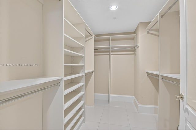 200 E Palmetto Park Rd Unit 714, Boca Raton, FL 33432 - walk in closet with light tile patterned flooring