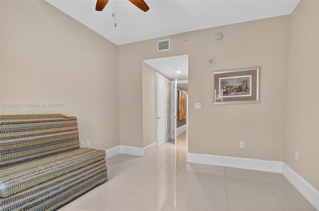 200 E Palmetto Park Rd Unit 714, Boca Raton, FL 33432 - empty room with a ceiling fan and light tile patterned flooring