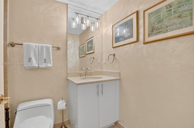 200 E Palmetto Park Rd Unit 714, Boca Raton, FL 33432 - bathroom featuring vanity and toilet