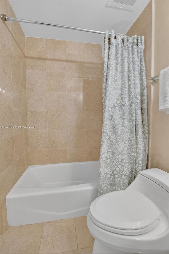 200 E Palmetto Park Rd Unit 714, Boca Raton, FL 33432 - bathroom featuring shower / tub combo with curtain and tile patterned floors
