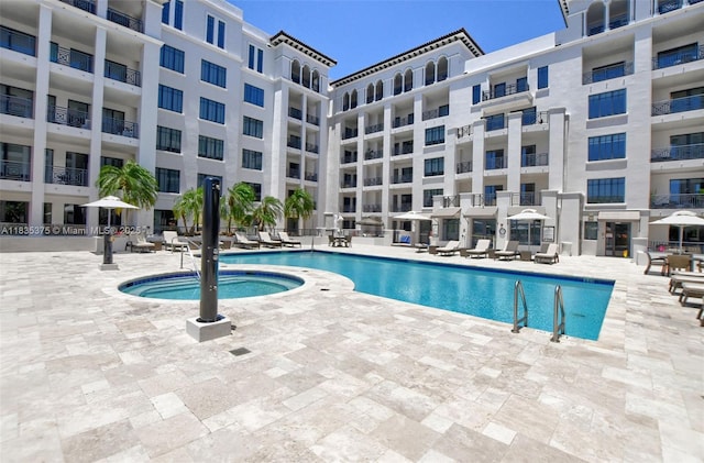 200 E Palmetto Park Rd Unit 714, Boca Raton, FL 33432 - community pool with a patio area and a community hot tub