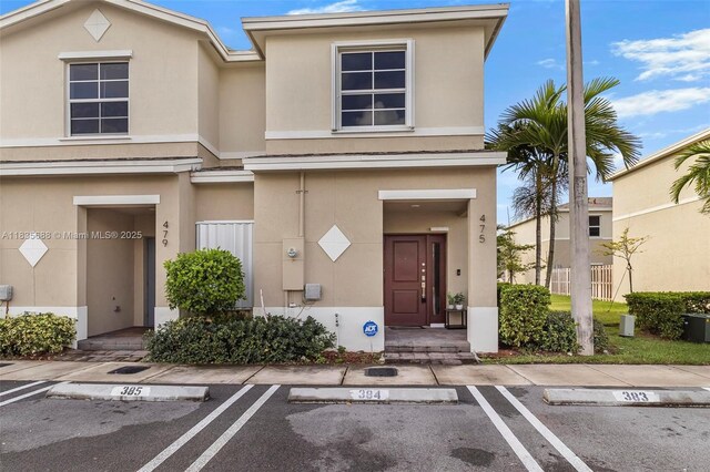 475 NE 5th Ln, Florida City, FL 33034 - empty room featuring a ceiling fan and light tile patterned flooring