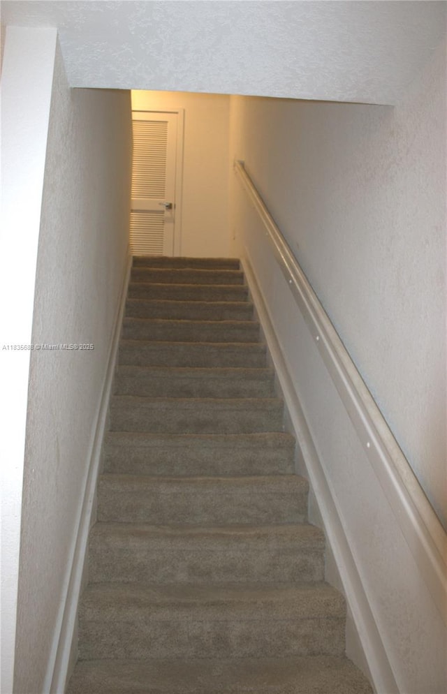 475 NE 5th Ln, Florida City, FL 33034 - stairs featuring a textured wall