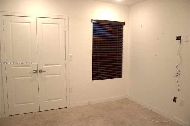 475 NE 5th Ln, Florida City, FL 33034 - unfurnished bedroom with carpet floors and a closet