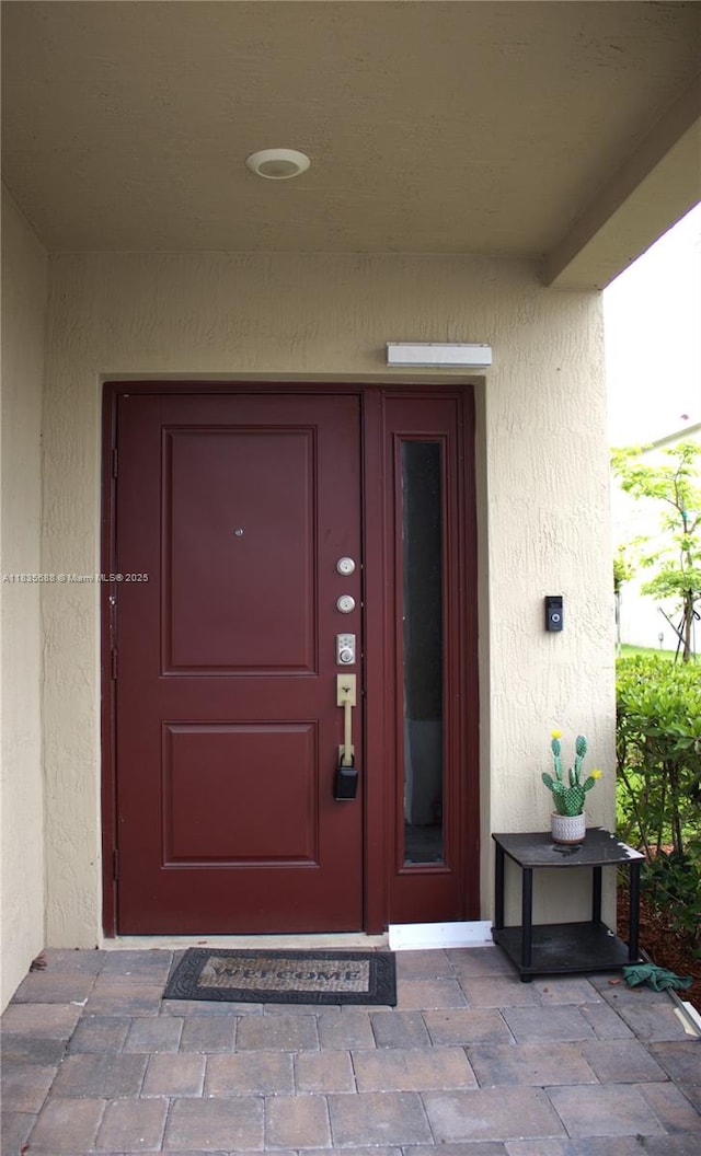 475 NE 5th Ln, Florida City, FL 33034 - view of exterior entry with stucco siding