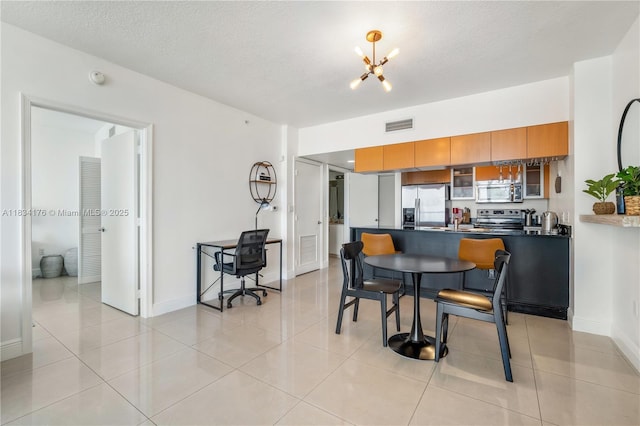 1750 N Bayshore Dr Unit 1611, Miami, FL 33132 - dining room with a chandelier, a textured ceiling, and light tile patterned flooring