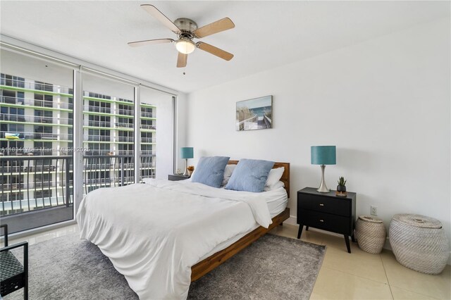 1750 N Bayshore Dr Unit 1611, Miami, FL 33132 - tiled bedroom with access to exterior, expansive windows, and ceiling fan