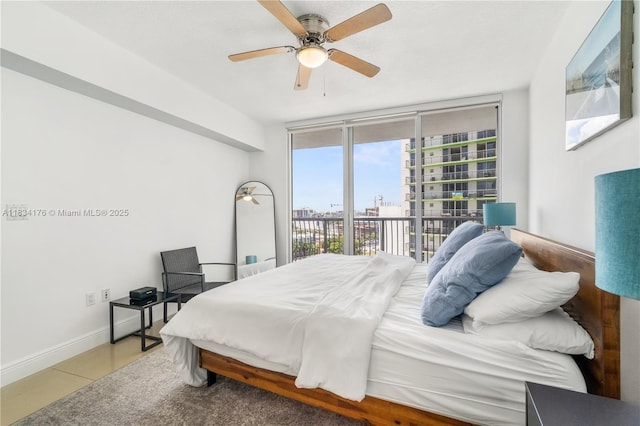 1750 N Bayshore Dr Unit 1611, Miami, FL 33132 - bedroom featuring access to exterior, a city view, ceiling fan, and tile patterned floors