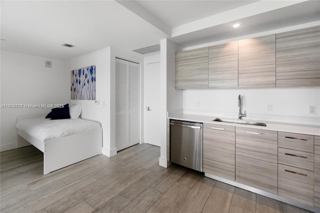 121 NE 34th St Unit 3012, Miami, FL 33137 - kitchen featuring dishwasher, modern cabinets, light countertops, light wood-type flooring, and recessed lighting