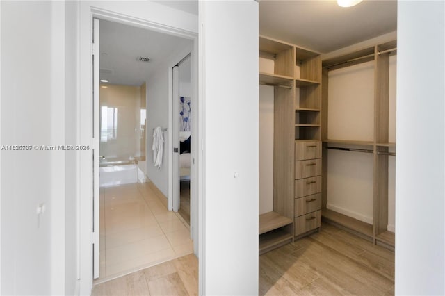 121 NE 34th St Unit 3012, Miami, FL 33137 - spacious closet with light wood finished floors