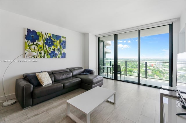 121 NE 34th St Unit 3012, Miami, FL 33137 - living area with expansive windows and wood finished floors
