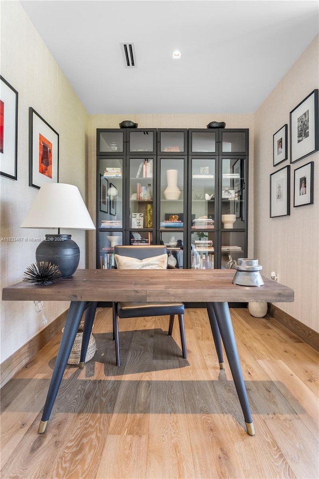 3910 Battersea Rd, Miami, FL 33133 - home office featuring wood finished floors and baseboards