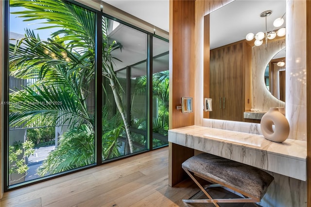 3910 Battersea Rd, Miami, FL 33133 - bathroom featuring vanity and wood finished floors