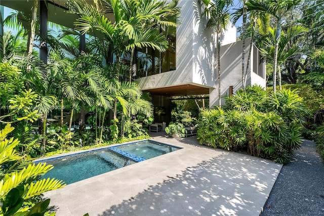 3910 Battersea Rd, Miami, FL 33133 - view of pool with an in-ground hot tub