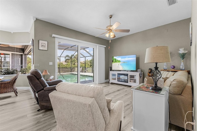 7130 Scarlet Sage Ct, Punta Gorda, FL 33955 - living room with light wood-type flooring and ceiling fan