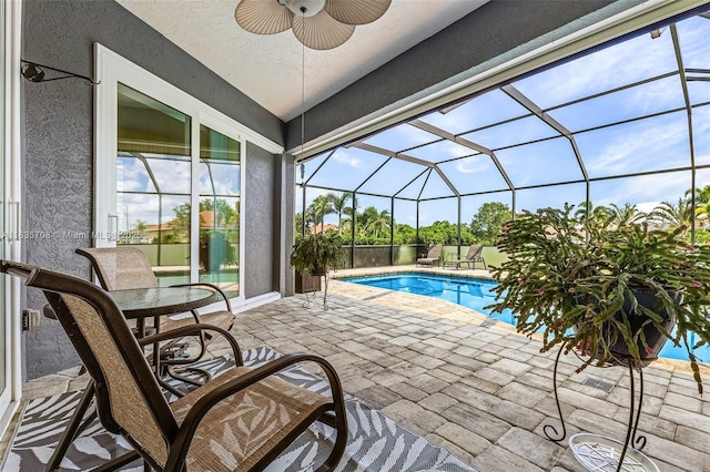 7130 Scarlet Sage Ct, Punta Gorda, FL 33955 - swimming pool with a patio, ceiling fan, and glass enclosure