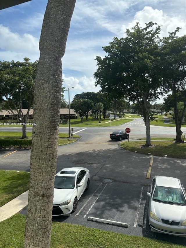1001 Green Pine Blvd Unit H2, West Palm Beach, FL 33409 - view of uncovered parking lot
