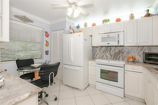 901 Colony Point Cir Unit 107, Pembroke Pines, FL 33026 - kitchen with white appliances, ornamental molding, light tile patterned floors, ceiling fan, and white cabinets