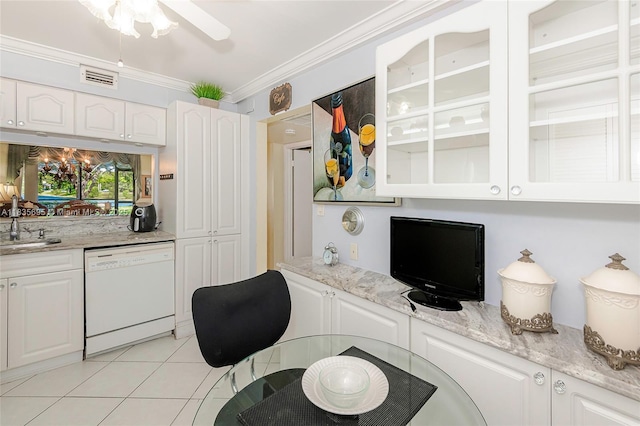 901 Colony Point Cir Unit 107, Pembroke Pines, FL 33026 - kitchen featuring dishwasher, ornamental molding, light tile patterned flooring, white cabinetry, and light stone counters
