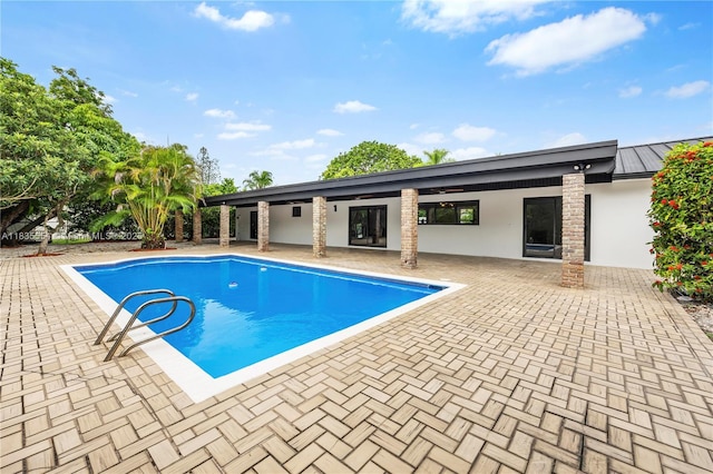 12505 SW 99th Ave, Miami, FL 33176 - swimming pool with a patio and ceiling fan