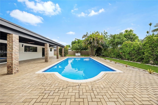 12505 SW 99th Ave, Miami, FL 33176 - view of swimming pool featuring a patio, ceiling fan, and a fenced backyard