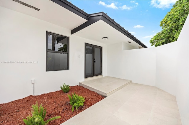 12505 SW 99th Ave, Miami, FL 33176 - property entrance with stucco siding