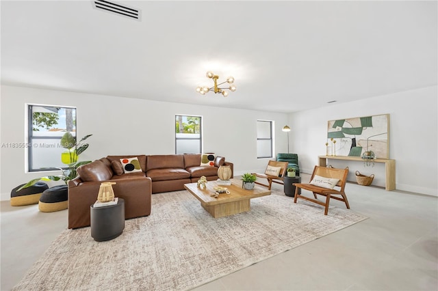 12505 SW 99th Ave, Miami, FL 33176 - living area with healthy amount of natural light and a chandelier