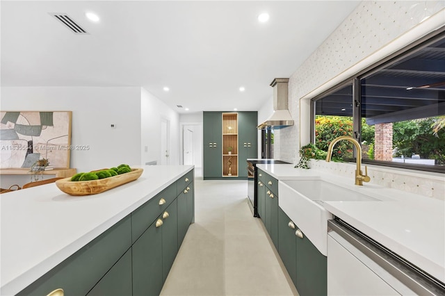 12505 SW 99th Ave, Miami, FL 33176 - kitchen with green cabinets, dishwashing machine, light countertops, recessed lighting, and finished concrete floors