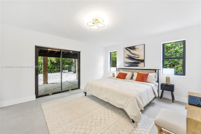 12505 SW 99th Ave, Miami, FL 33176 - bedroom with access to exterior and baseboards