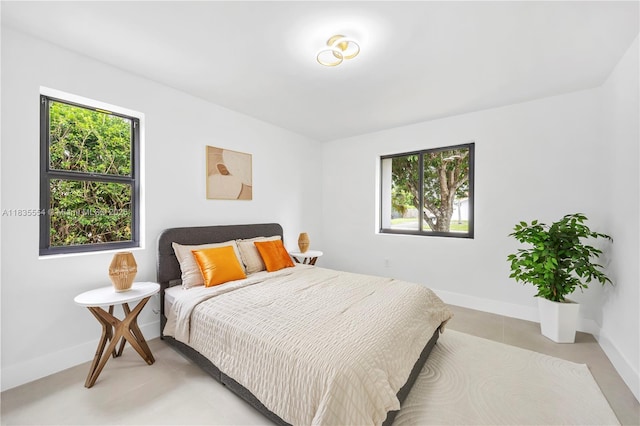 12505 SW 99th Ave, Miami, FL 33176 - bedroom featuring multiple windows and light tile patterned floors