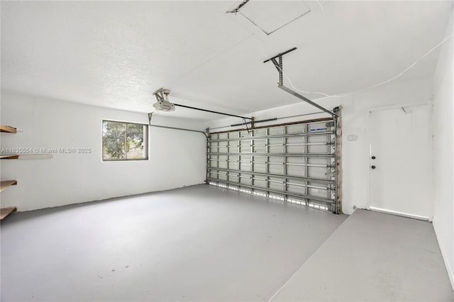12505 SW 99th Ave, Miami, FL 33176 - garage featuring a garage door opener