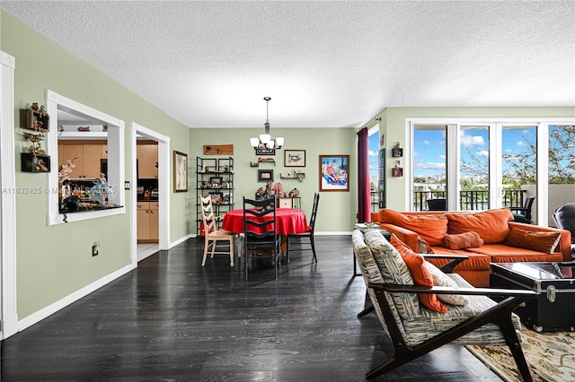 9341 E Bay Harbor Dr Unit 3D, Bay Harbor Islands, FL 33154 - dining space featuring a chandelier, a textured ceiling, and wood finished floors