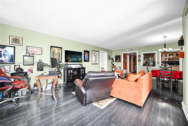 9341 E Bay Harbor Dr Unit 3D, Bay Harbor Islands, FL 33154 - living area featuring wood finished floors and a chandelier