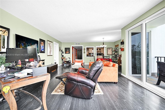 9341 E Bay Harbor Dr Unit 3D, Bay Harbor Islands, FL 33154 - living area featuring wood finished floors, a chandelier, a textured ceiling, and an office area