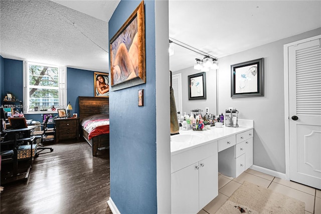 9341 E Bay Harbor Dr Unit 3D, Bay Harbor Islands, FL 33154 - bathroom with vanity, wood finished floors, and ensuite bath