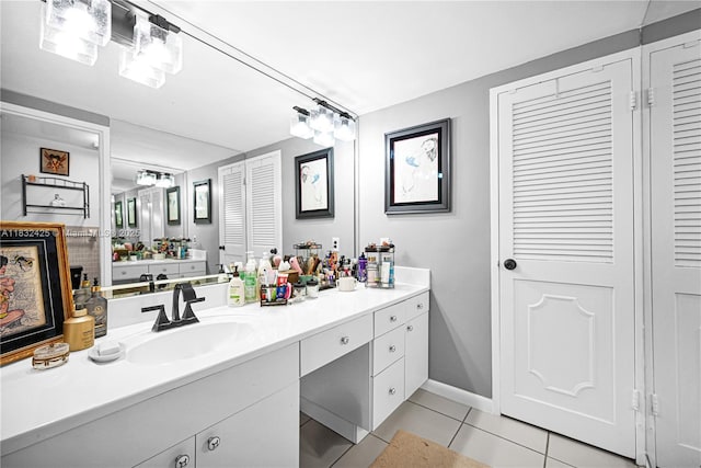 9341 E Bay Harbor Dr Unit 3D, Bay Harbor Islands, FL 33154 - bathroom with a closet, tile patterned floors, and vanity
